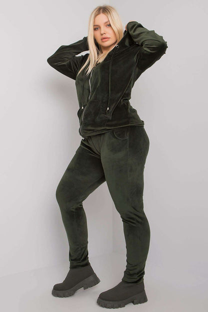 Luxurious Plus Size Velour Set: Zip-Up Hoodie and Tie-Waist Pants for Ultimate Comfort, modeled in a green velour outfit with a stylish hood, emphasising comfort and luxury.
