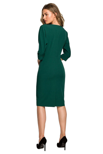 Stylove elegant daydress showcasing the back view with feminine detailing and batwing sleeves in luxurious green fabric, perfect for stylish women.