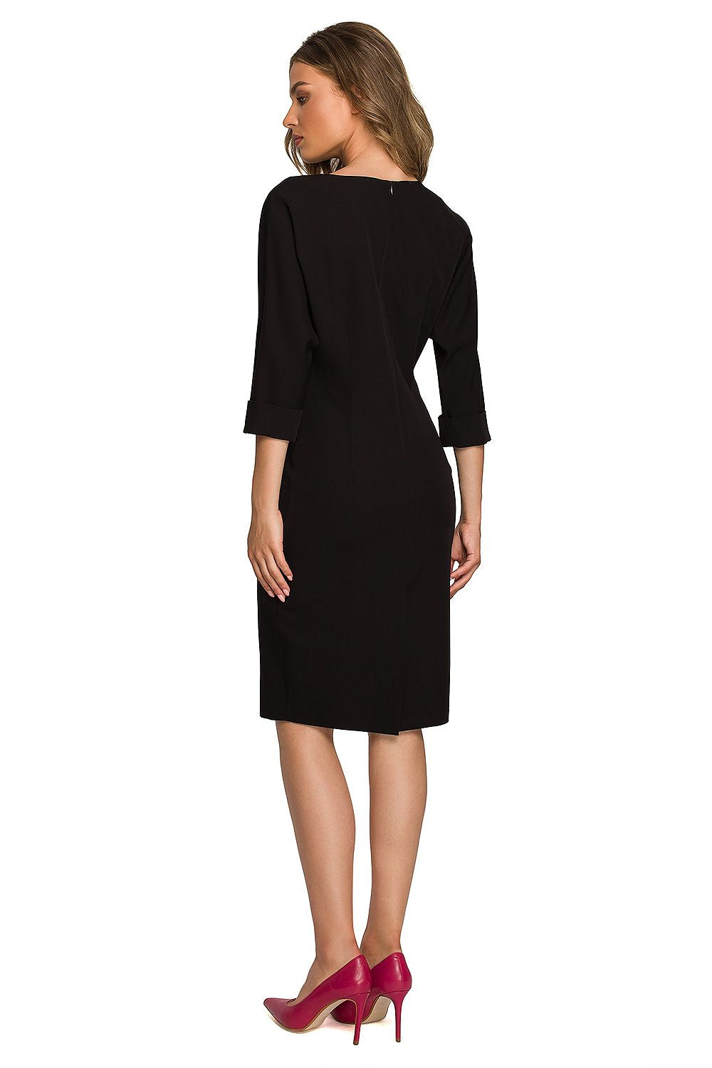Back view of an elegant women's daydress in black, showcasing the graceful batwing sleeves and a stylish silhouette, suitable for upscale events.