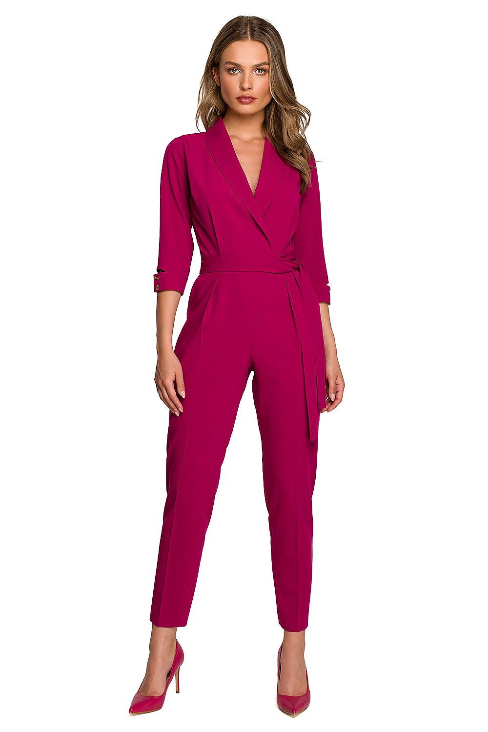 Stylove's vibrant pink jumpsuit with a flattering envelope neckline, waist tie, and decorative sleeves, perfect for a stylish night out.