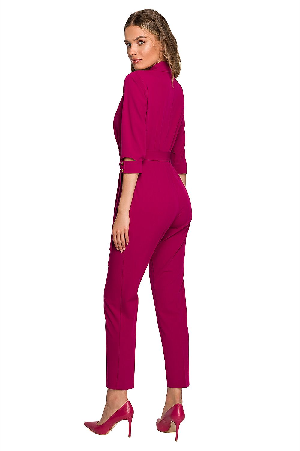 Back view of a stylish pink jumpsuit by Stylove, highlighting elegant design features and a tailored fit, ideal for evening occasions.