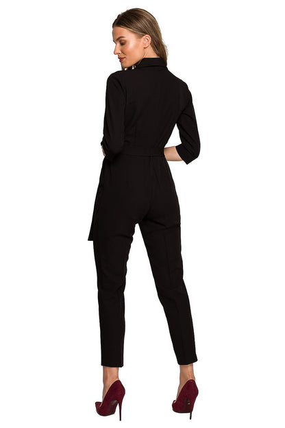 Stylove elegant black jumpsuit featuring a shawl collar, waist tie, and decorative cracks, showcased from the back view, perfect for office chic styling.