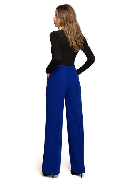 Sophisticated rear view of a model wearing a black top with striking blue wide cropped trousers by Stylove, exuding a sense of elegance and contemporary style.