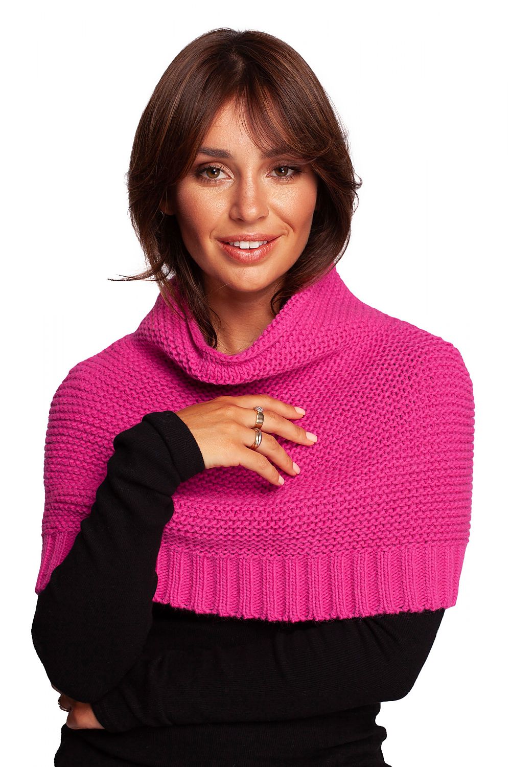 Elegant woman wearing a vibrant pink luxurious 3-way infinity scarf by BE Knit, showcasing warmth and style.