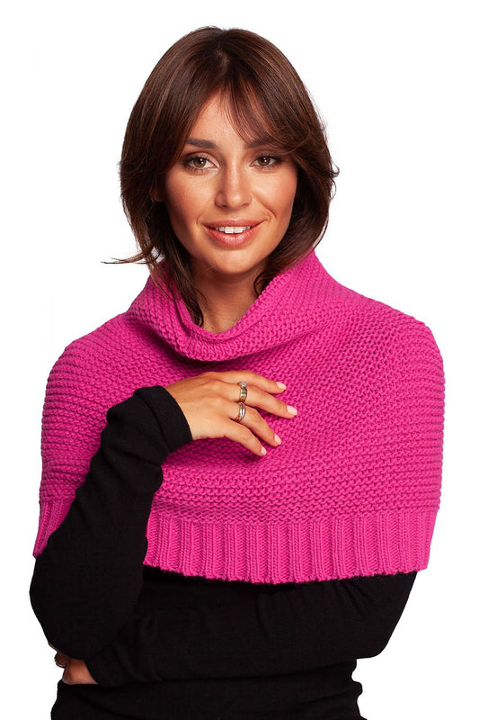 Elegant woman wearing a vibrant pink luxurious 3-way infinity scarf by BE Knit, showcasing warmth and style.