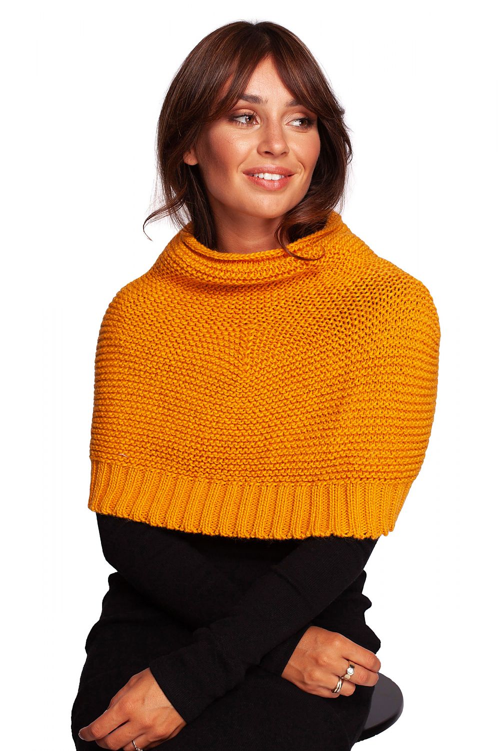 Sophisticated woman adorned in a sunny yellow luxurious 3-way infinity scarf by BE Knit, blending warmth and elegance.