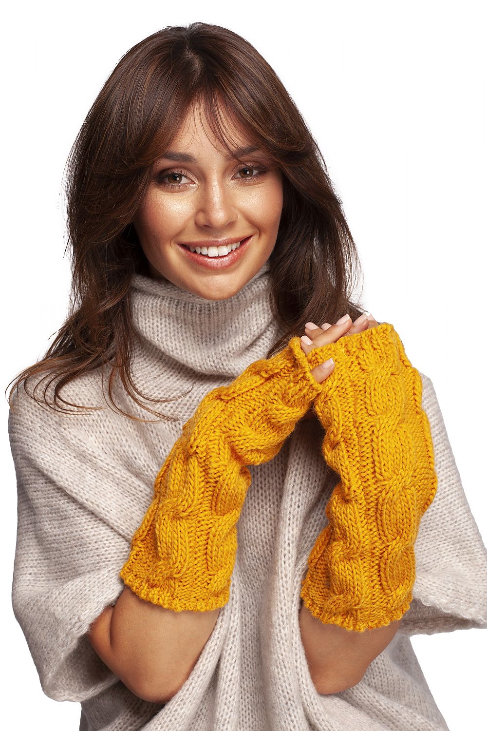 Elegant woman showcasing luxurious ribbed fingerless gloves in vibrant yellow, styled in cozy knitwear.