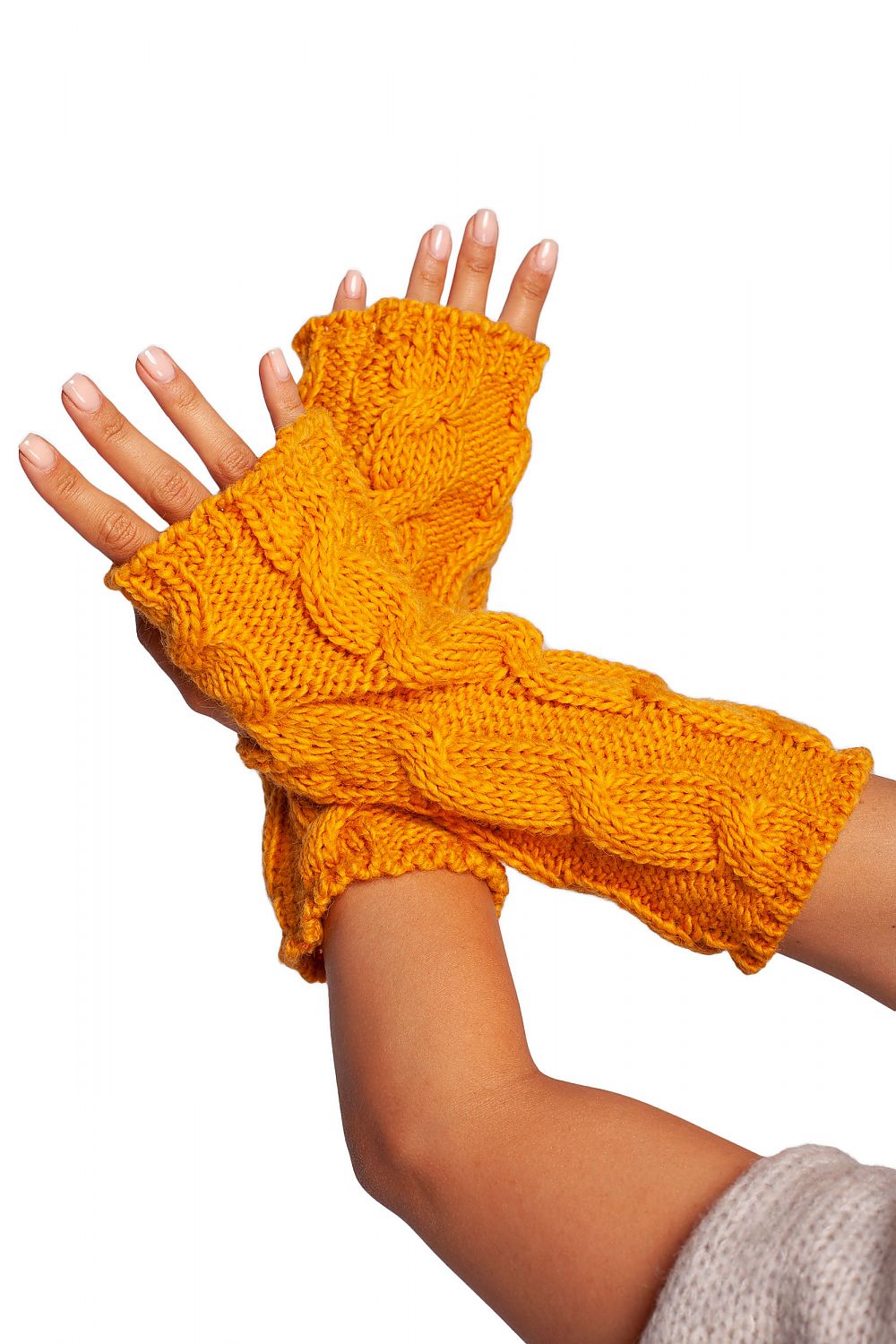 Close-up view of opulent yellow ribbed fingerless gloves, highlighting exquisite texture and intricate knit design.