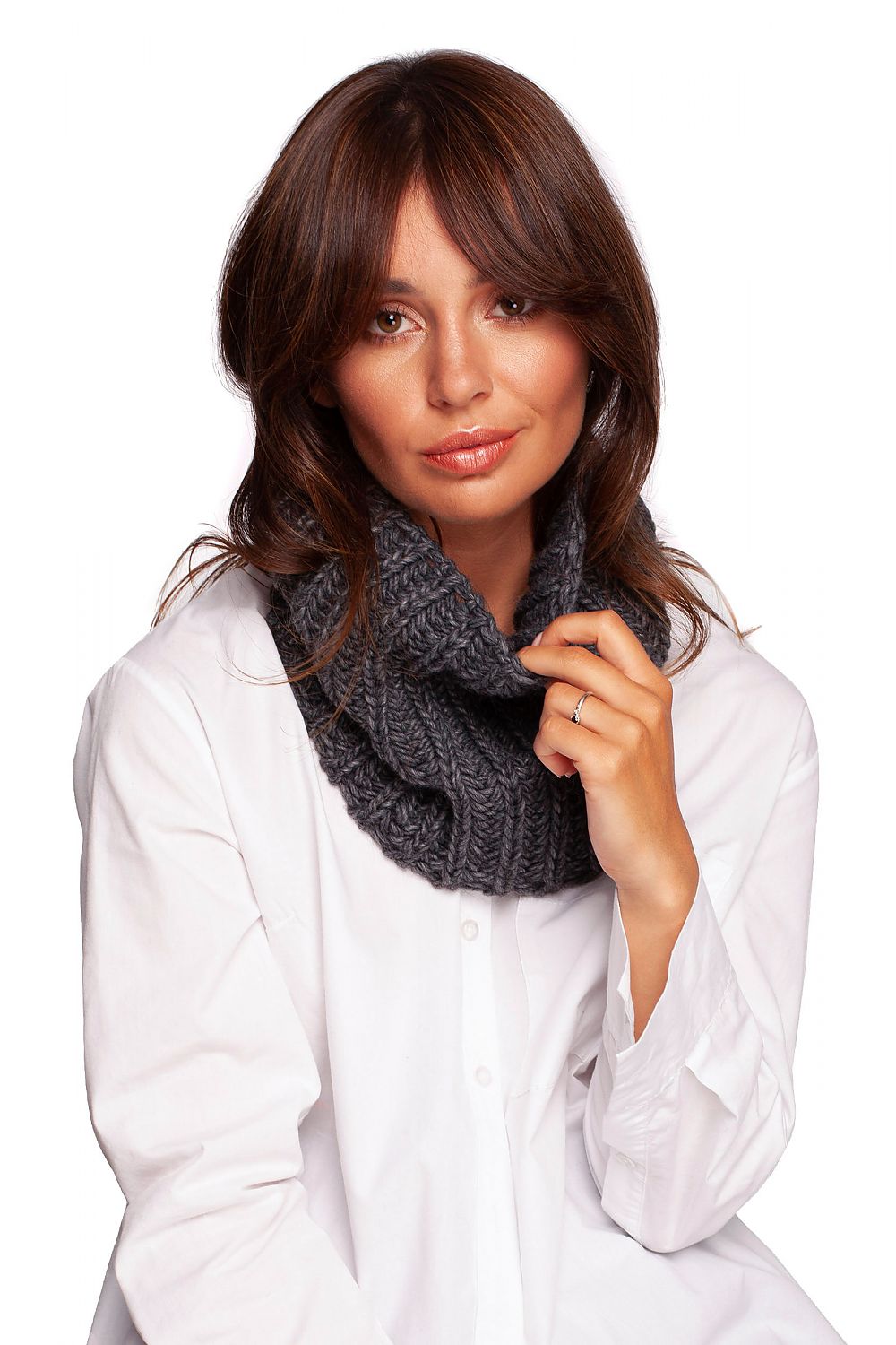 Chic model draped in a timeless grey infinity scarf, radiating luxury and comfort on stylish winter days.