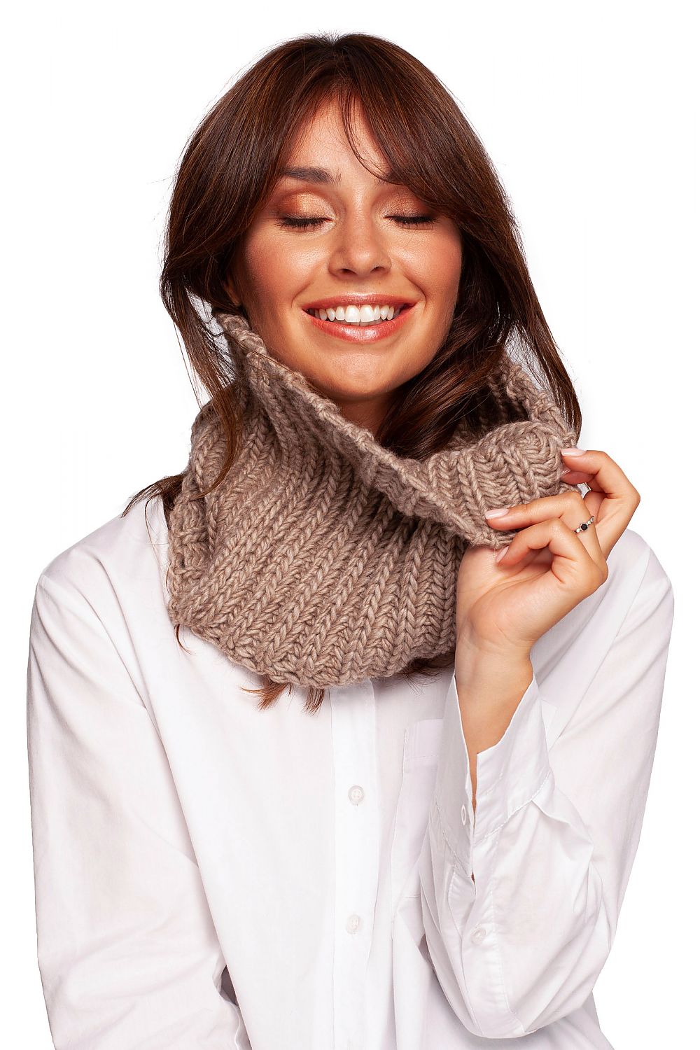 Elegant woman wearing a luxurious 75% acrylic infinity scarf by BE Knit, exuding warmth and style, showcasing the scarf's rich texture and cozy design.