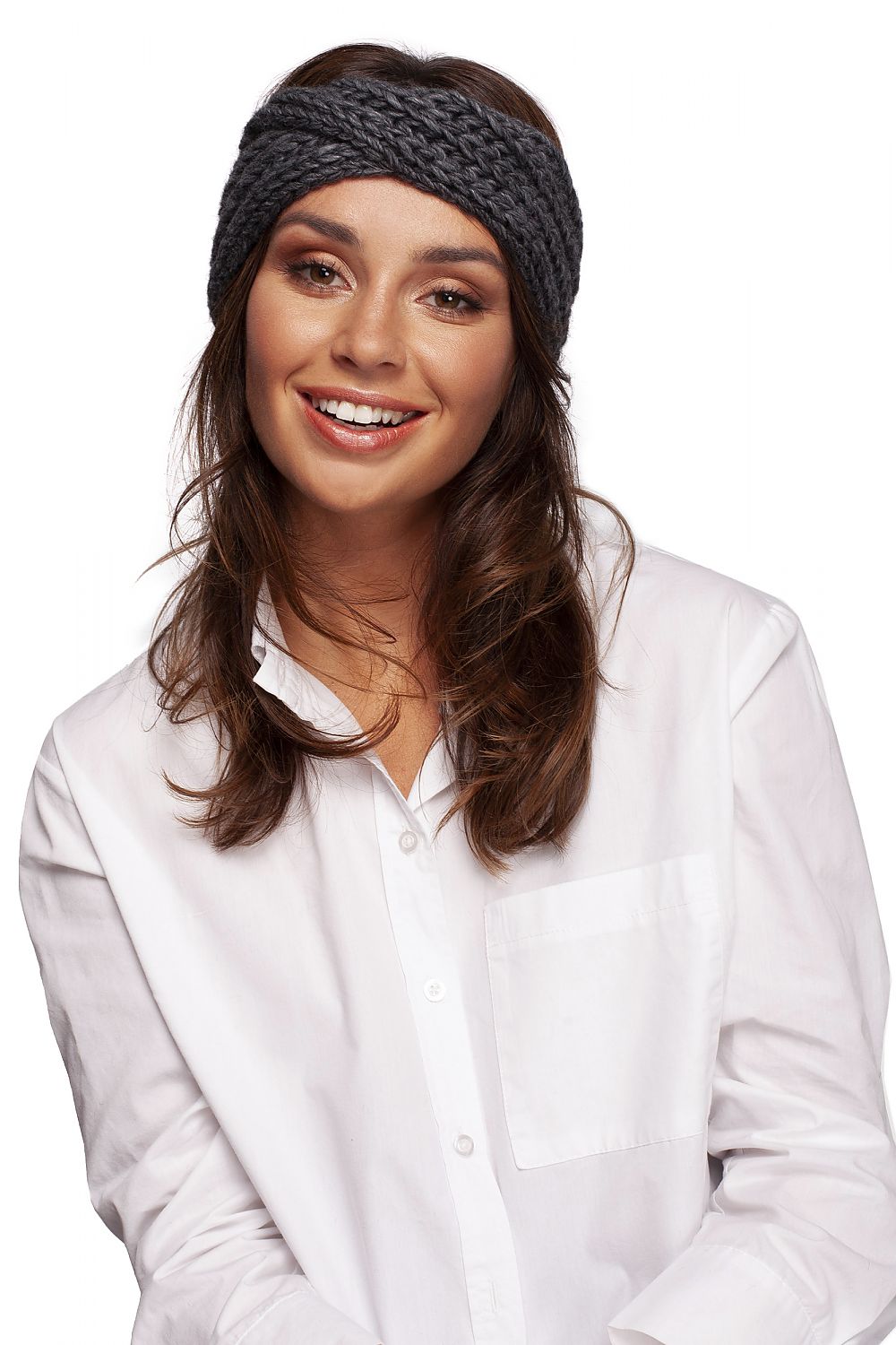 Smiling woman adorned with a luxurious grey headband by BE Knit, highlighting her elegant look while providing warmth and fashion for winter.