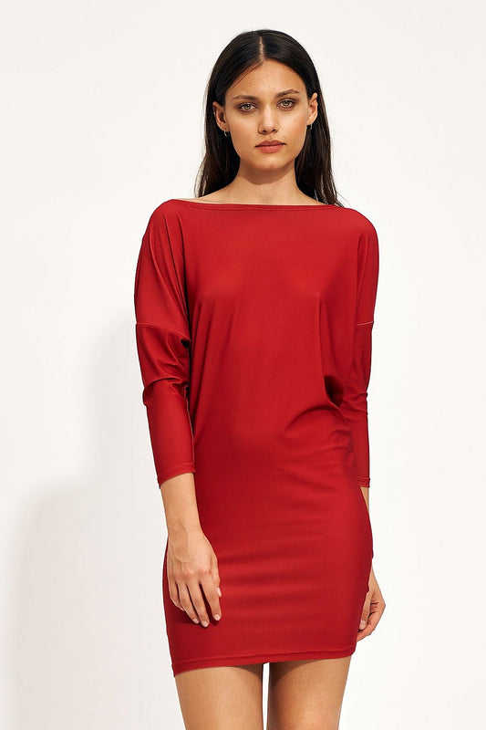 Elegant red mini dress featuring bat sleeves and a boat neckline, designed for modern chic styling, showcasing a fitted silhouette.
