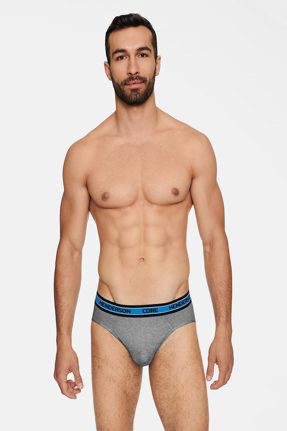 Classically styled male model wearing Henderson Boost Comfort Briefs in a sophisticated grey tone, accented by a sleek black elastic waistband with the iconic Henderson branding.