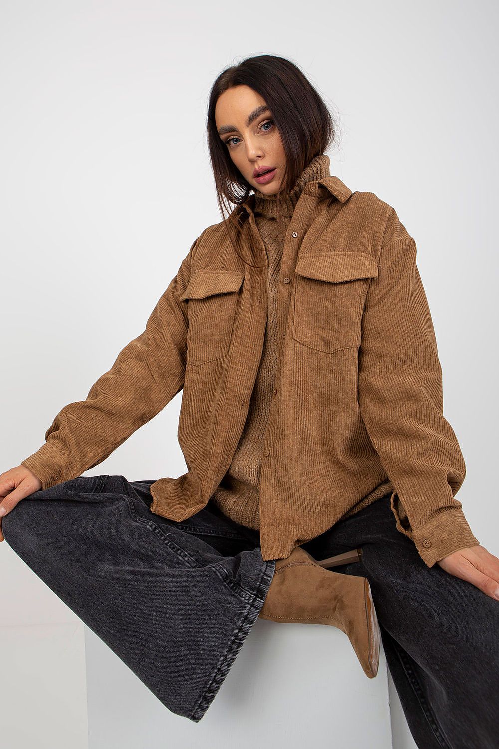 Stylish luxury corduroy long sleeve button-down shirt for men, featuring a contemporary design and paired with chic accessories, perfect for versatile outfit options.