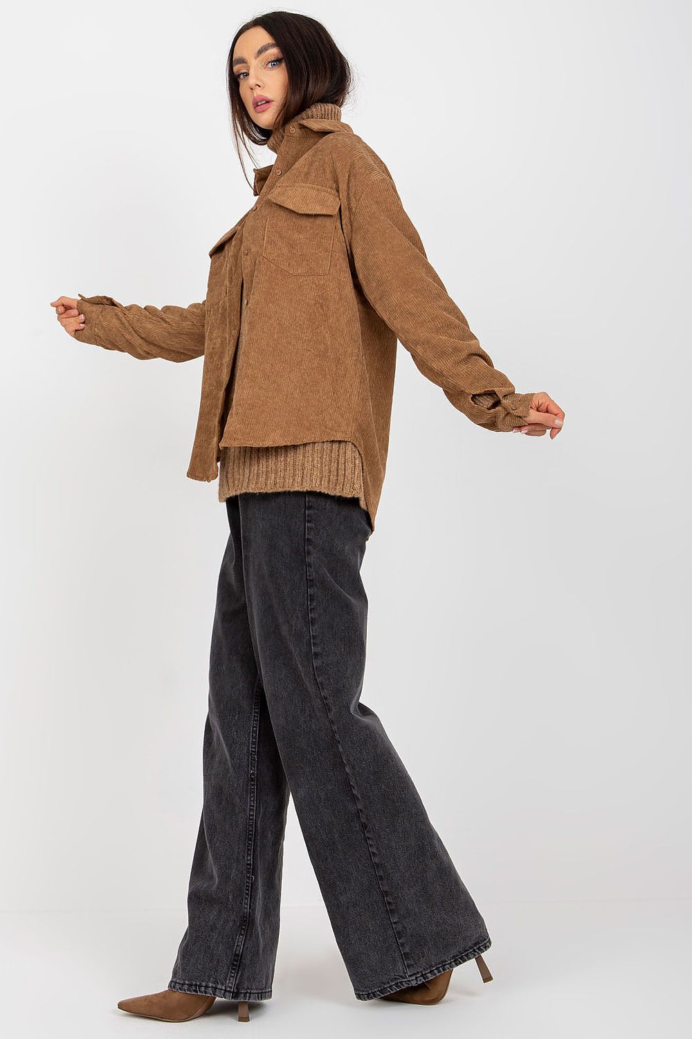 Side view of a Fashionable Corduroy Long Sleeve Button-Down Shirt for Men, complemented by a turtleneck and wide-leg pants, highlighting a versatile luxury style.