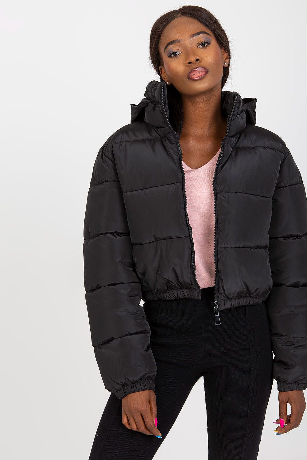 Chic front view of a trendy black quilted jacket, elegantly styled with a casual look, ideal for modern winter fashion.