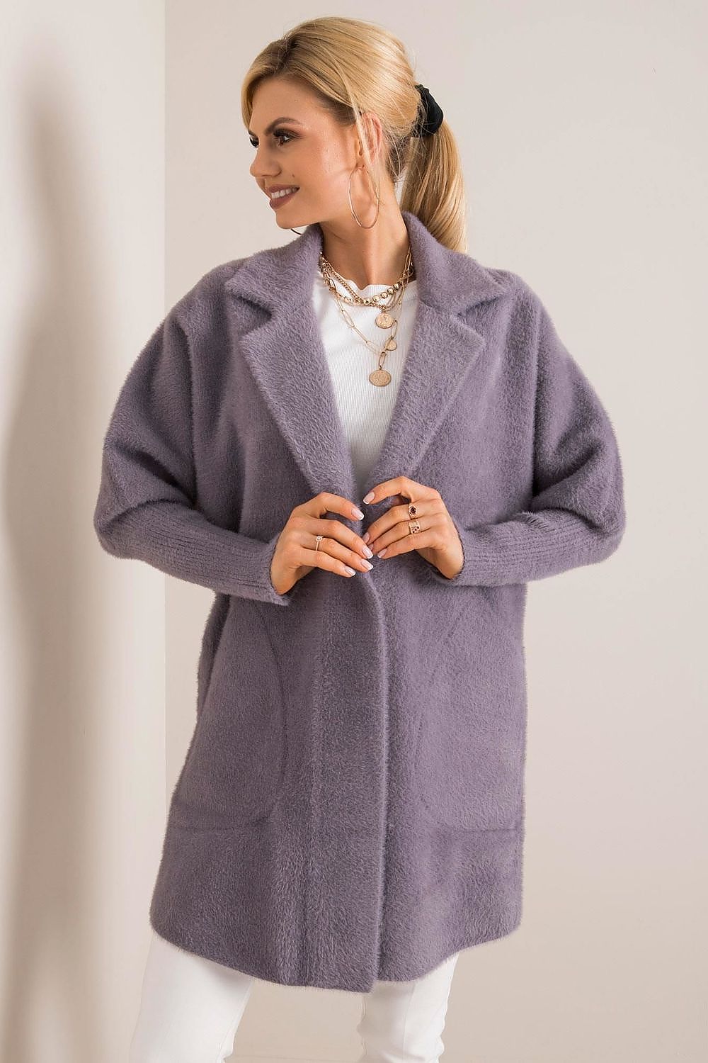 Elegant luxury women's wool blend coat in soft lilac, featuring angora blend and stylish press stud fastening, perfect for autumn wear. Styled with a chic layered necklace, enhancing the sophisticated look.