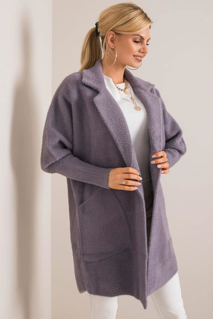 Graceful front view of a luxury women's lilac wool blend coat with angora, showcasing a modern silhouette and ample slip pockets, ideal for stylish autumn outfits.