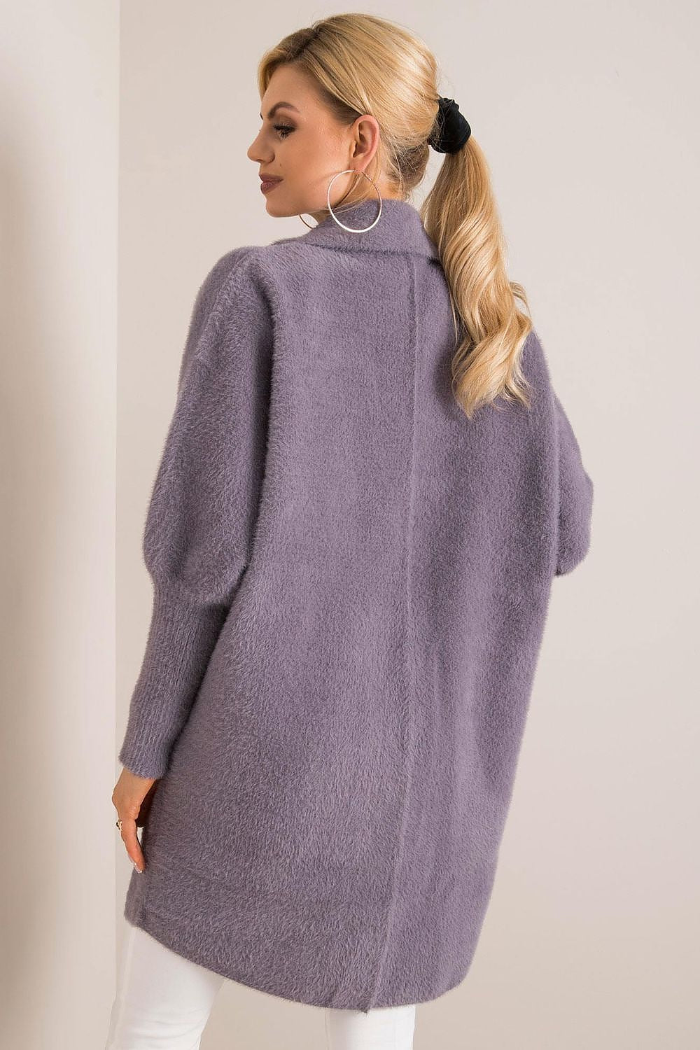 Luxurious back view of a women's soft wool blend coat in light lilac, highlighting the elegant design and premium materials, perfect for a refined autumn wardrobe.