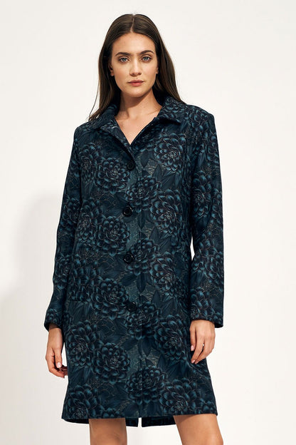 Chic floral patterned coat by Nife, presented on a model, exuding an elegant and timeless style. The coat features a classic collar and button closure, perfect for an upscale wardrobe.