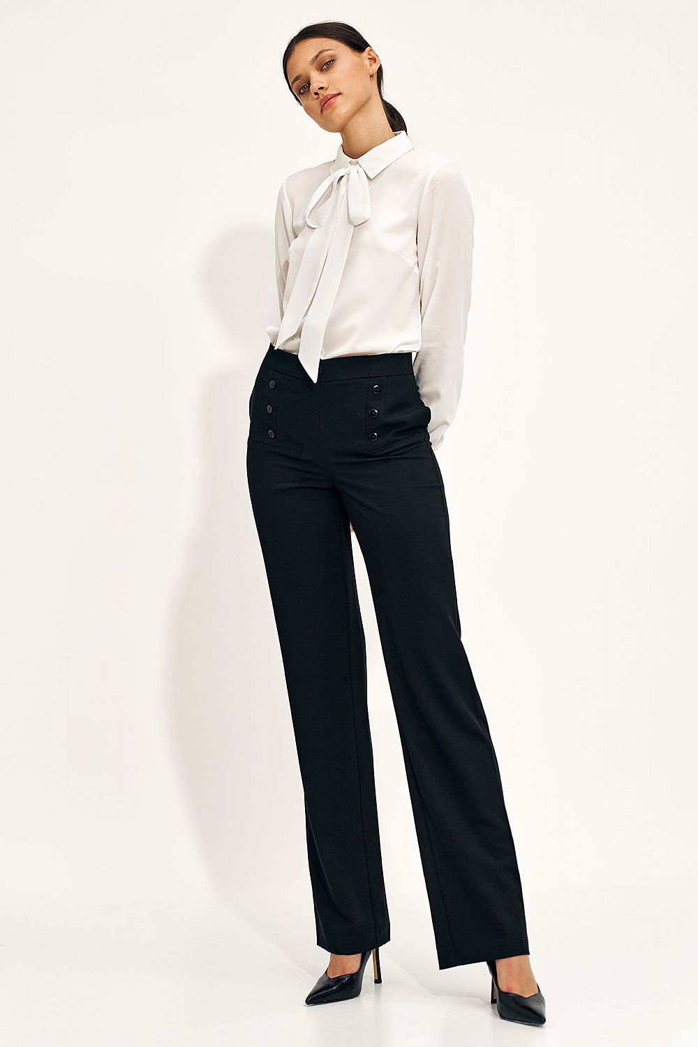 Elegant high-rise wide-leg trousers for women by Nife, featuring stylish button details, paired with a luxurious white blouse and high heels, perfect for sophisticated office wear.