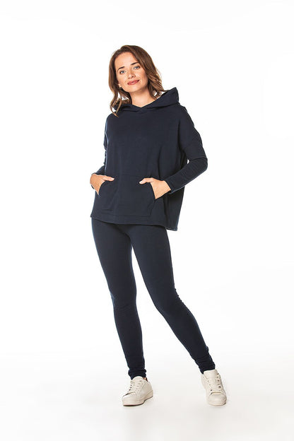 Elegant navy blue cotton knit tracksuit ensemble by Tessita, worn by a model with a stylish hooded top and pocketless trousers, exuding comfort and casual chic.