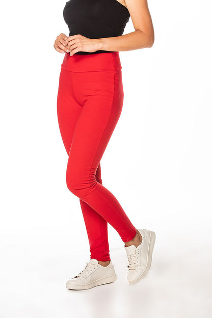 Luxurious red cotton knit tracksuit trousers by Tessita, featuring a high waistband and a flattering fit, designed for comfort and style.