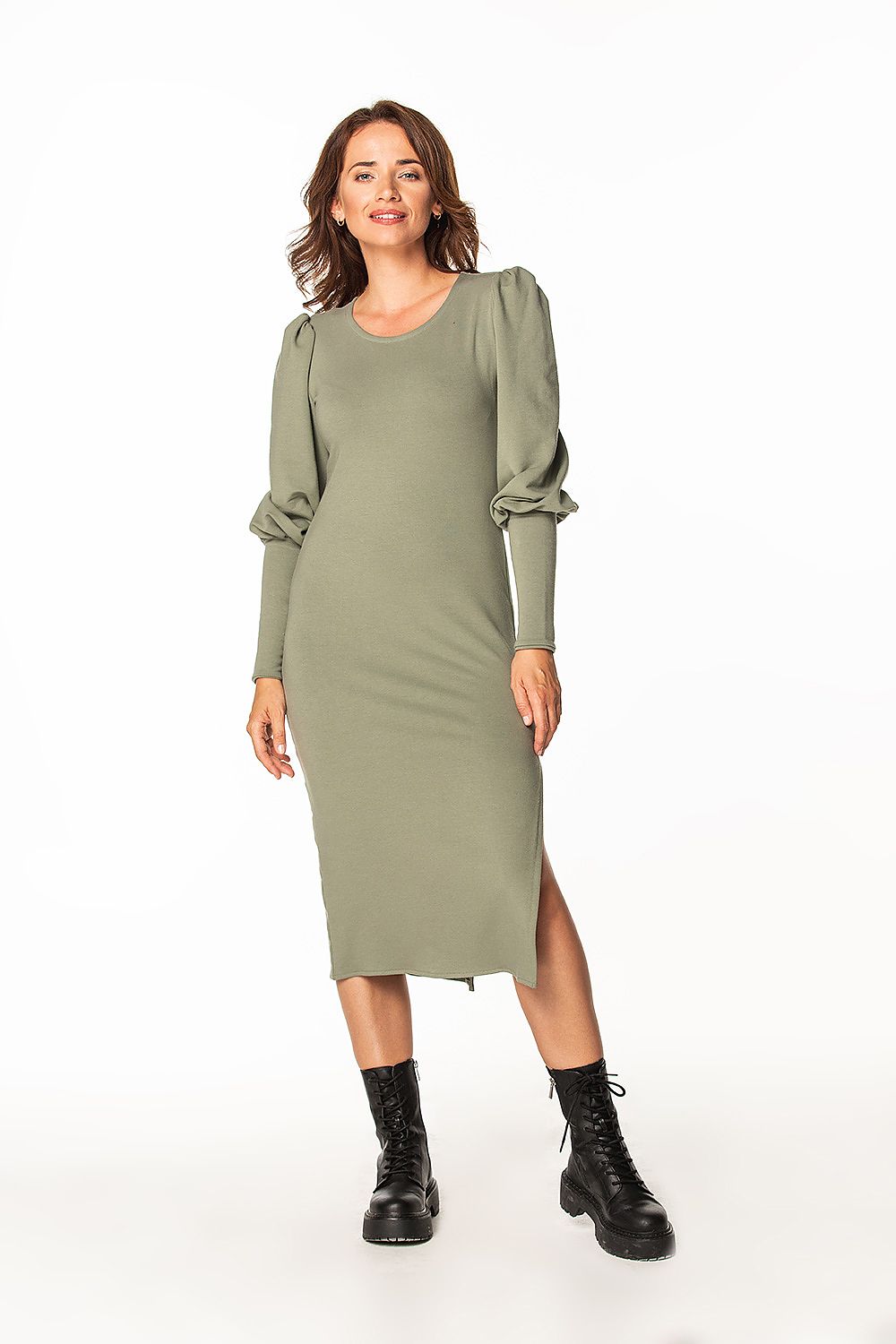 Stunning view of the Tessita knitted midi dress on a model showcasing stylish long cuffed sleeves and a flattering silhouette.