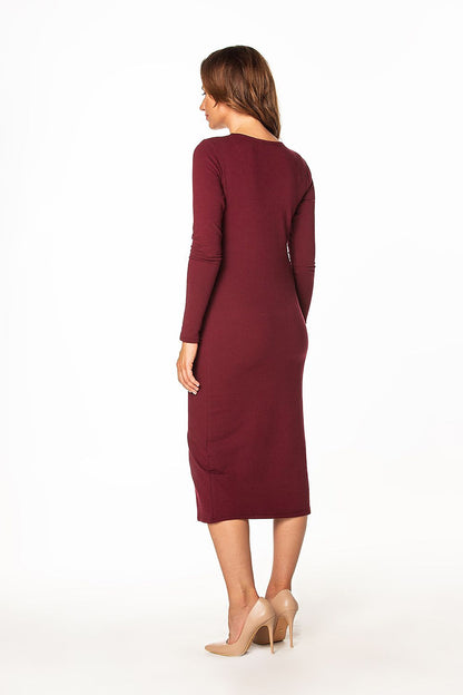 Rear view of a luxurious burgundy cotton knit dress by Tessita, highlighting the elegant long sleeves and boat neckline for a striking silhouette.