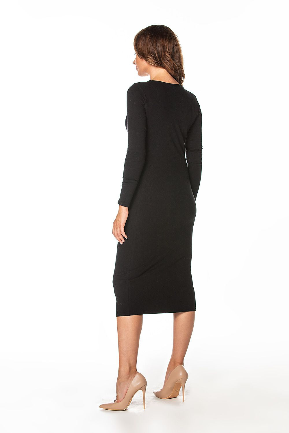 Back view of the luxurious Tessita long cotton knit dress in black, highlighting its elegant design and flattering fit, complemented by chic high-heeled shoes.