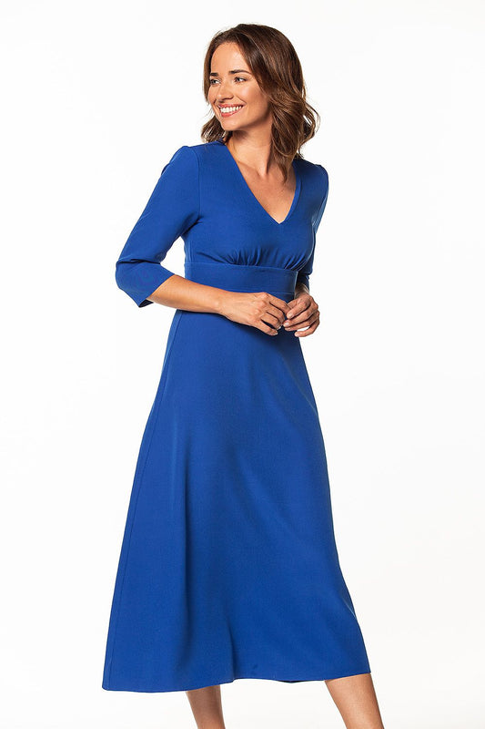 Elegant Tessita maxi dress in vibrant blue, featuring 3/4 sleeves and a flattering covered zipper, perfect for sophisticated occasions.