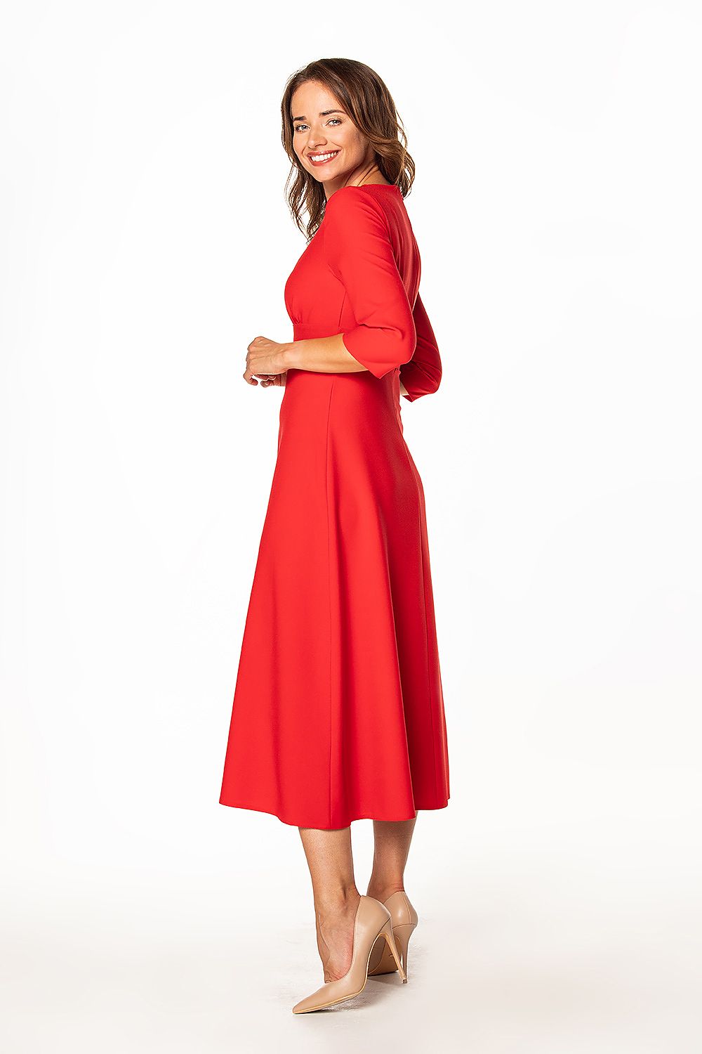 Charming view of a luxurious red maxi dress with pleated bust and 3/4 sleeves, designed by Tessita, embodying elegance and sophistication.