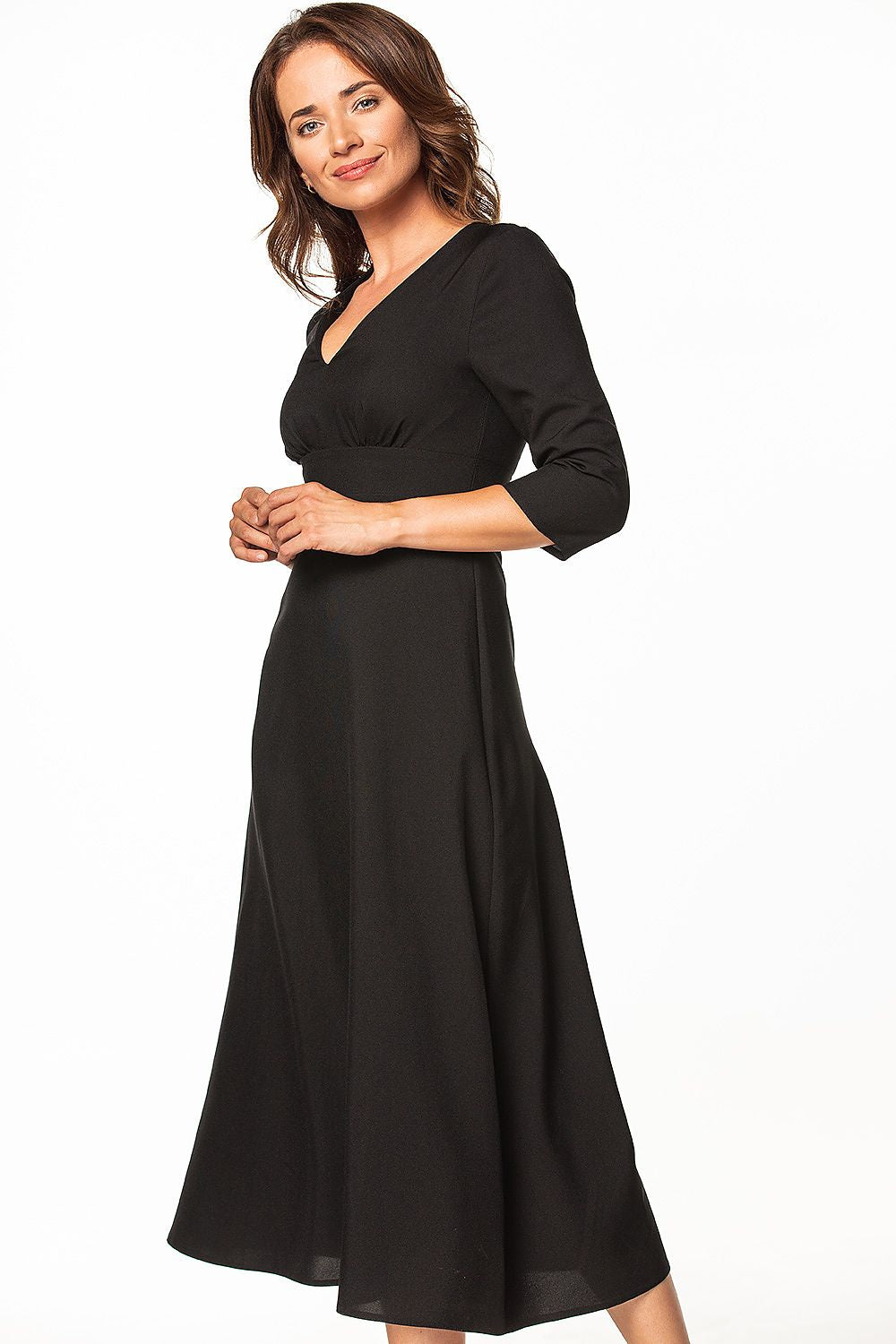 Elegant Tessita maxi dress featuring 3/4 sleeves and a covered zipper, perfect for luxurious occasions.