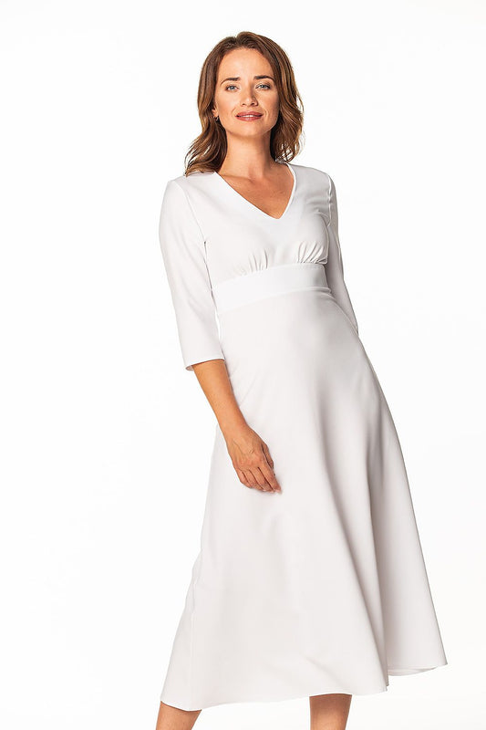 Elegant Maxi Dress by Tessita featuring 3/4 sleeves and a covered zipper, showcasing the luxurious and flattering design ideal for special occasions.