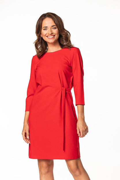 Elegant Daydress by Tessita featuring a stylish tie waist and 3/4 sleeves, perfect for sophisticated daytime wear.