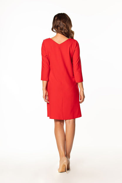 Model showcasing the Tessita Elegant Daydress in a chic midi length, ideal for brunch or casual outings.