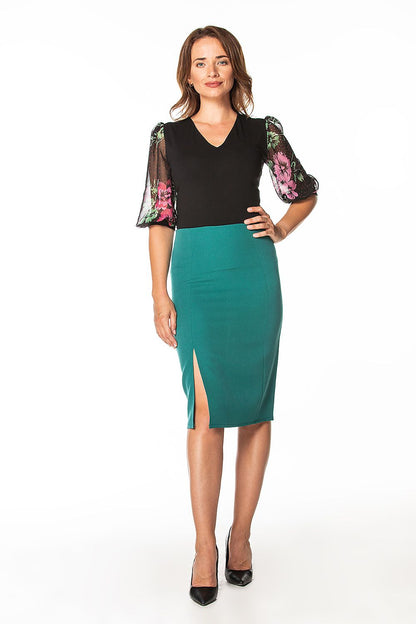 Elegant pencil midi skirt with a side slit and concealed zipper, designed by Tessita for a sophisticated look.