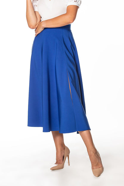 Elegant mid-calf skirt by Tessita featuring a stylish left side slit and decorative zipper, perfect for a sophisticated look.