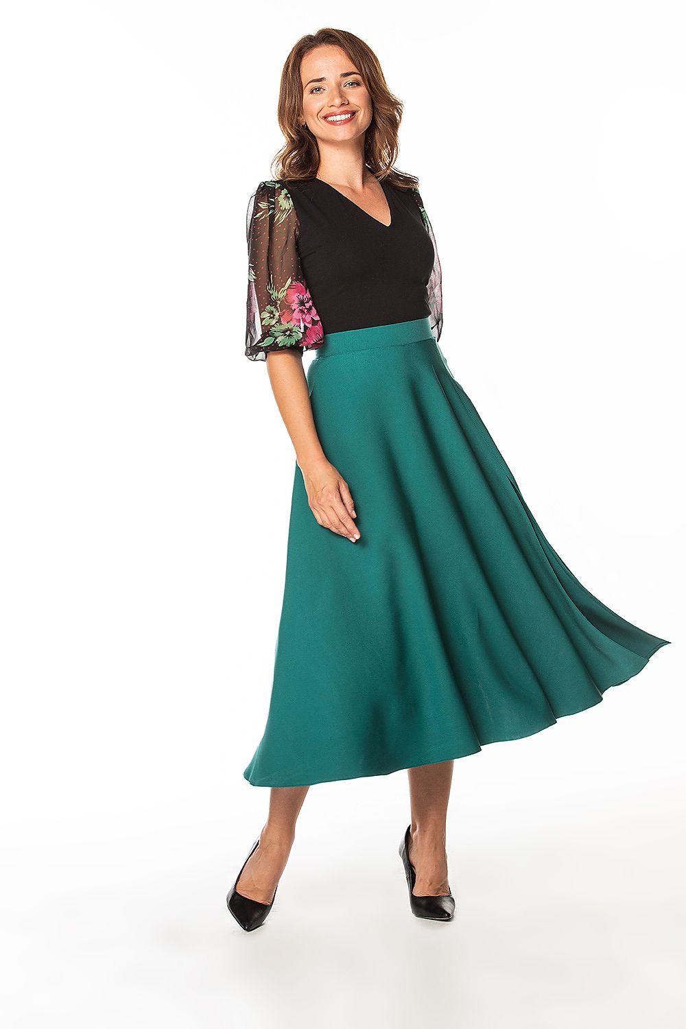 Elegant mid-calf skirt with side slit and decorative zipper by Tessita, showcasing a stylish design perfect for sophisticated occasions.