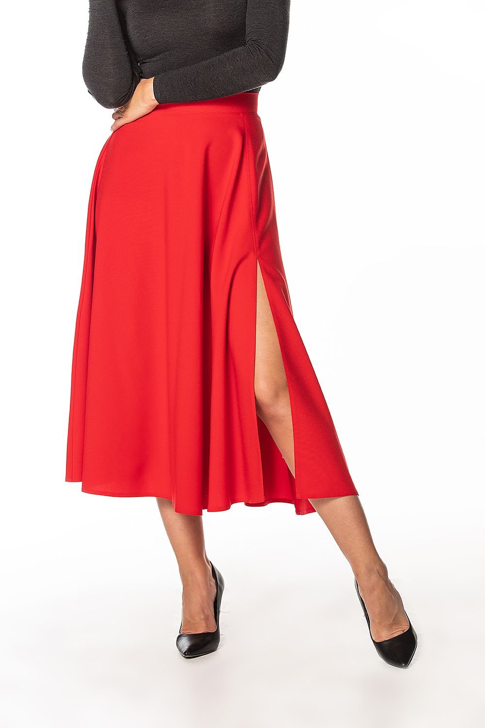 Elegant mid-calf skirt with side slit and decorative zipper by Tessita, showcasing luxurious design and flattering fit.