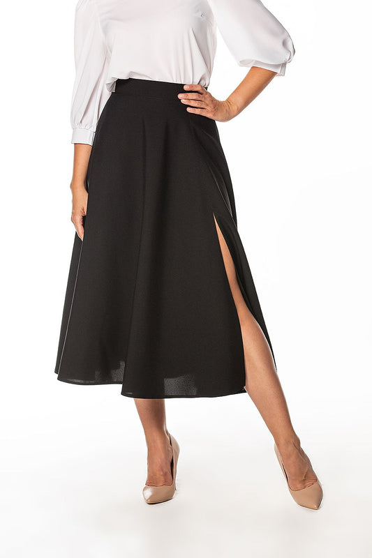 Tessita elegant mid-calf skirt showcasing a stylish left slit and decorative zipper detail, perfect for sophisticated occasions.