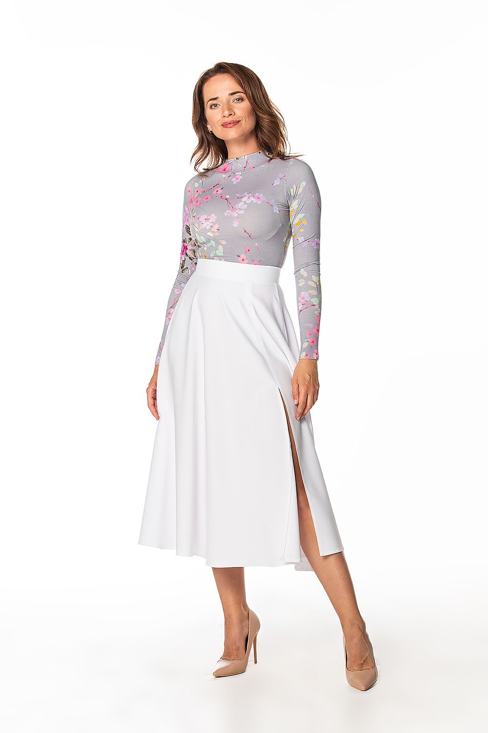 Tessita's stylish mid-calf skirt with a sophisticated side slit and decorative zipper, an exquisite choice for contemporary women's fashion.