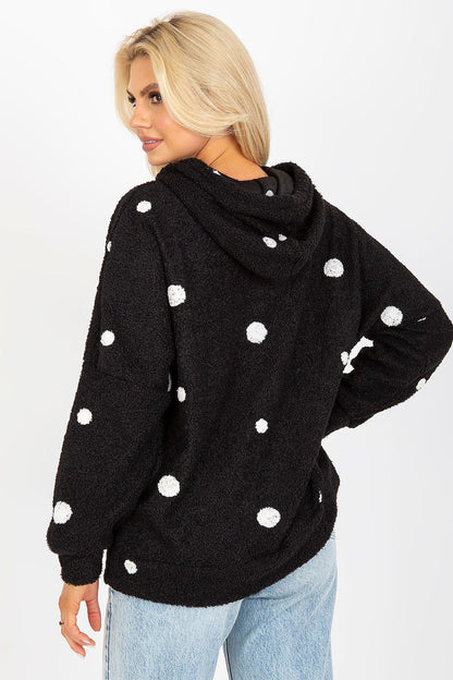 Elegant women's long-sleeved cotton-spandex sweatshirt in black with stylish white polka dots, featuring a cosy hood and slip pockets, showcasing a chic back view.
