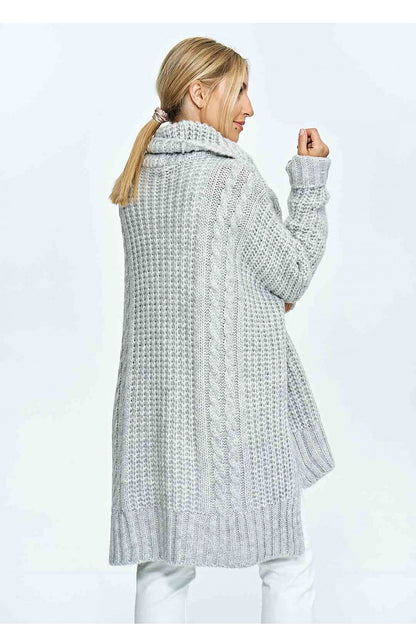 Back view of a high-quality grey oversized turtleneck sweater with intricate texture, showcasing an elegant draped silhouette.