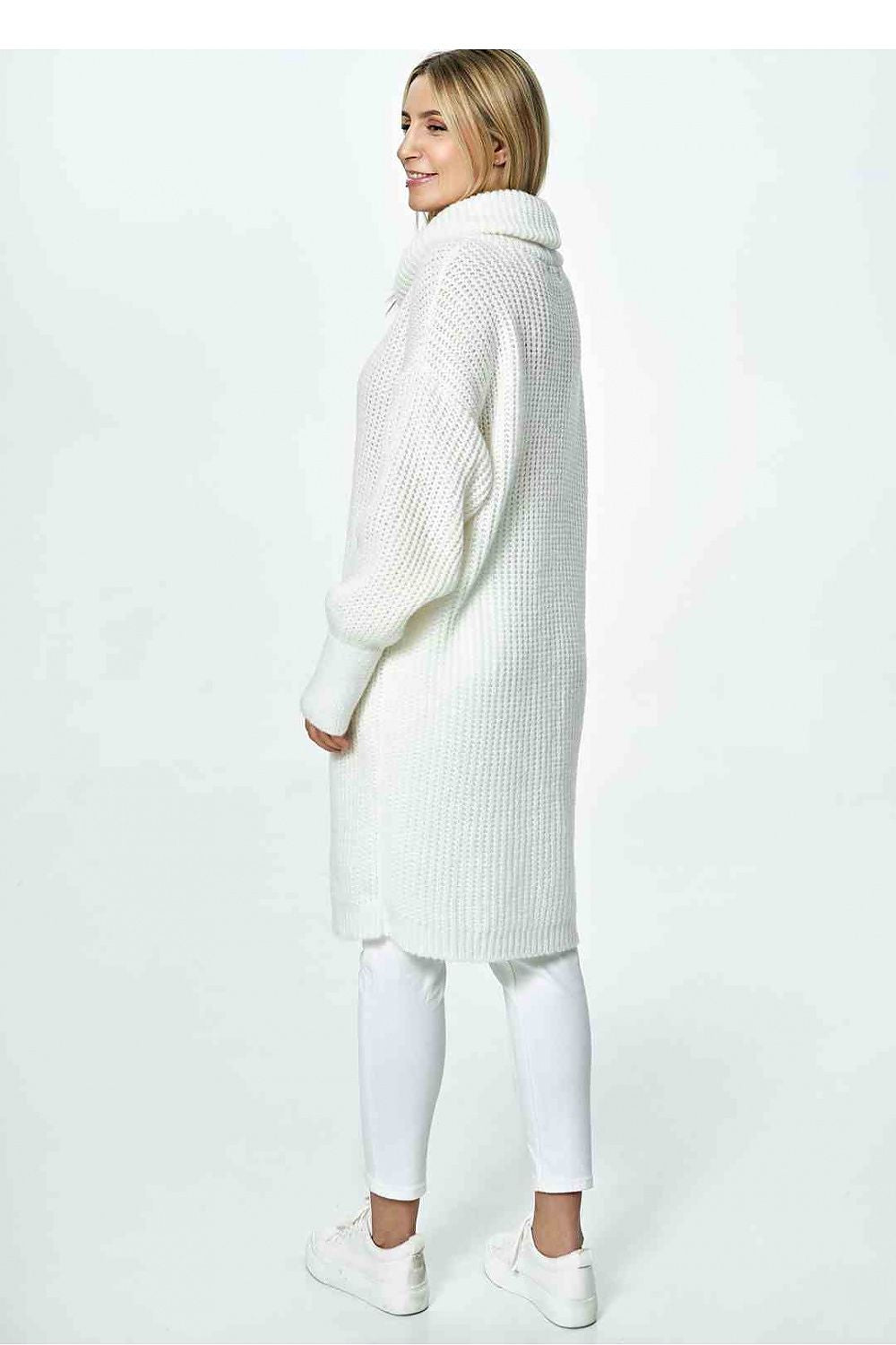 Side view of a sophisticated white long Figl jumper with a plush turtleneck, model displaying its graceful silhouette and casual chic appeal.