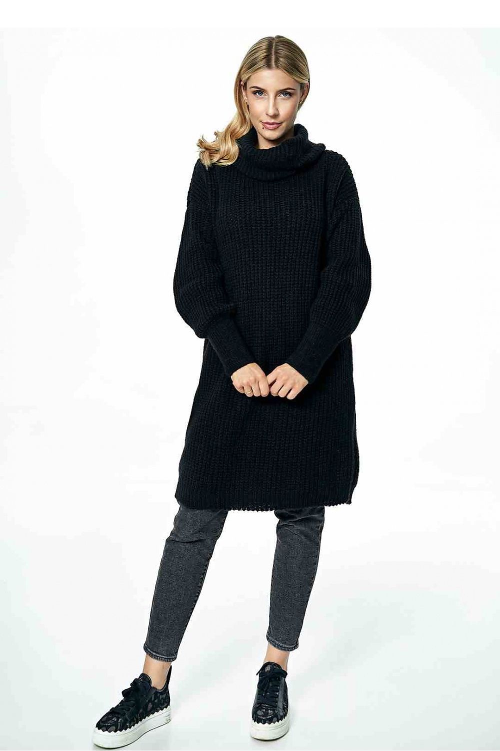 Front view of the luxurious Figl long black jumper featuring a stylish loose turtleneck, worn with chic black sneakers for a sophisticated casual look.