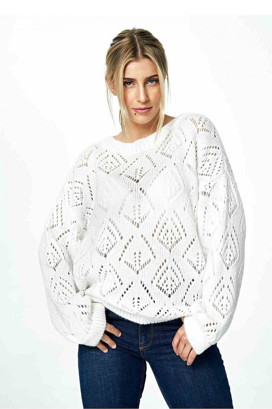 Luxurious Figl chic openwork sweater in white, featuring a half round neckline and long sleeves, paired with stylish denim. Ideal for an elegant yet casual look.