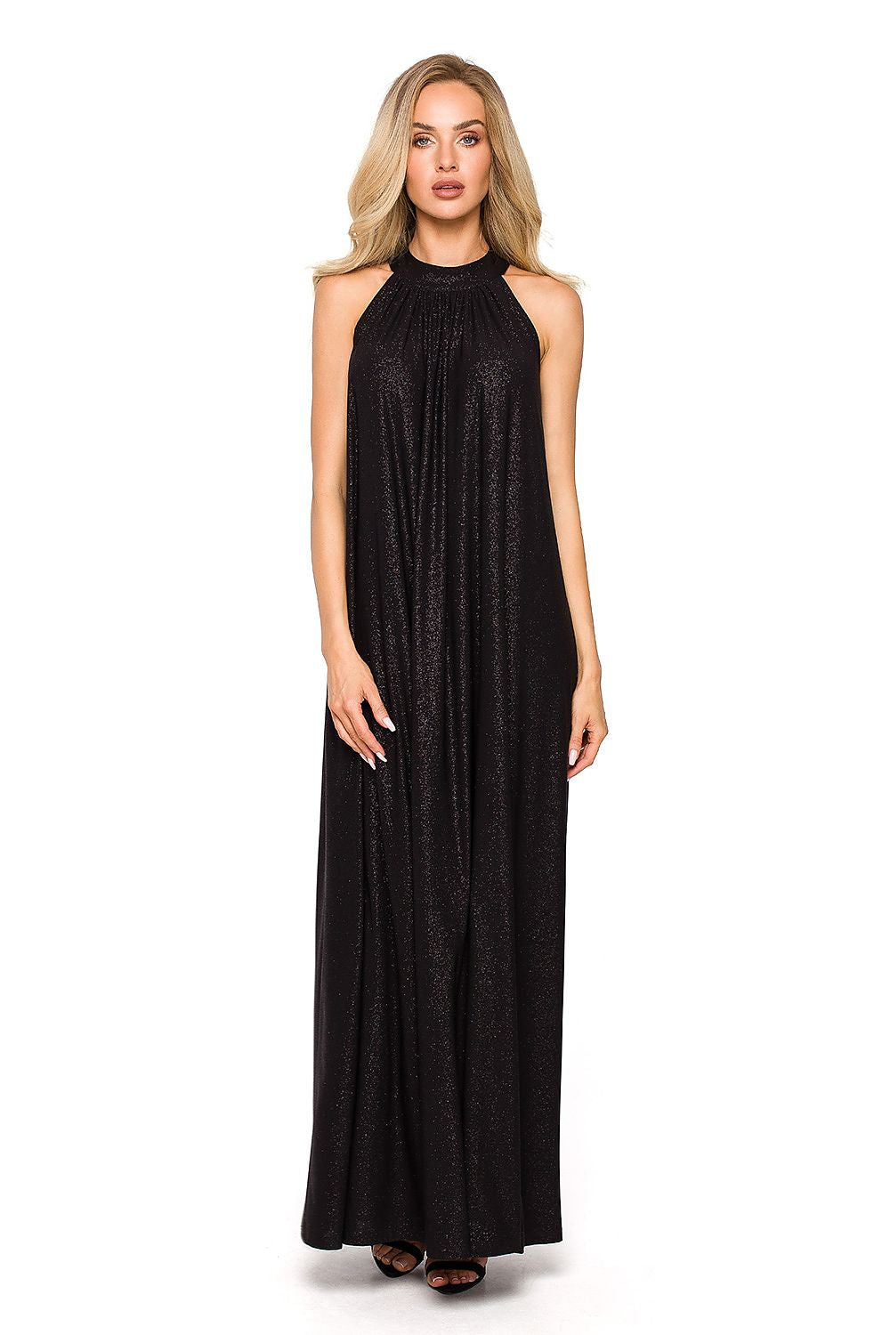 Luxurious black maxi evening dress with halter neckline and shimmering fabric, elegantly styled on a model, showcasing a flared silhouette and tie belt for sophisticated evening wear.