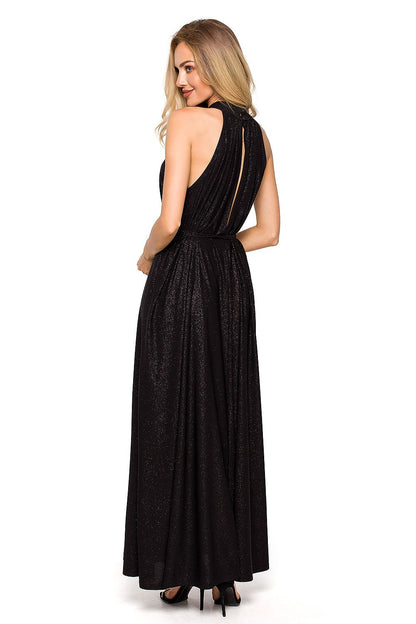Elegant back view of black maxi evening dress featuring a halter neckline and stylish cut-out detail, enhancing the flowing design and luxurious appeal perfect for formal occasions.