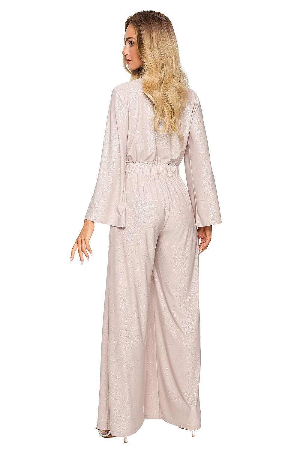 Elegant beige brocade trim jumpsuit featuring wide legs and sleeves, showcasing a comfortable and luxurious design.